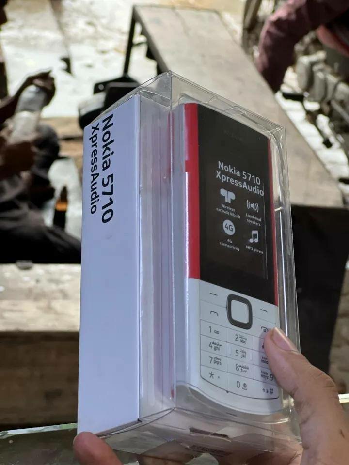 Nokia 5710 XA - 4G mobile phone, built-in wireless headphone