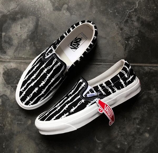 Vans Slip-On Noirs à Motif