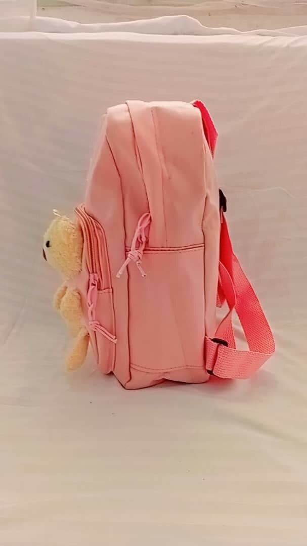 Sac rose enfant avec peluche