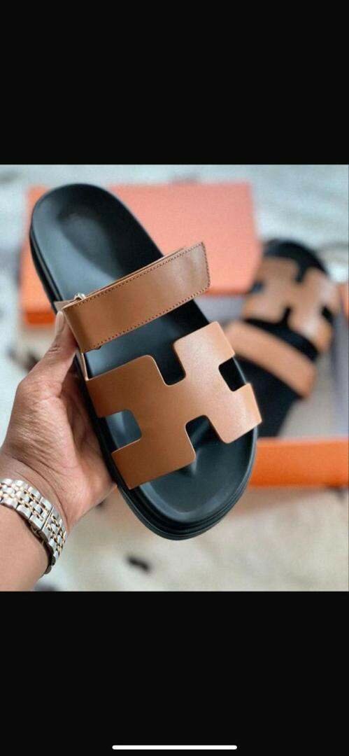 Hermes slippers available in brown, white, multicolored