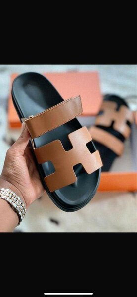 Hermes slippers available in brown, white, multicolored