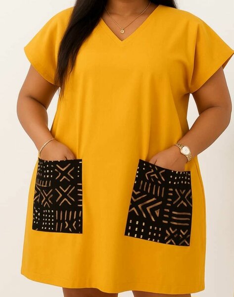 Robe jaune avec poches imprimées