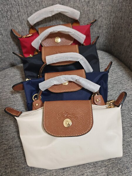 Sac à main Longchamp en cuir et toile