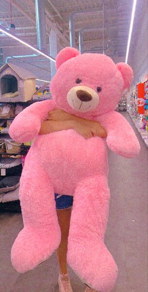 Gros ours en peluche rose