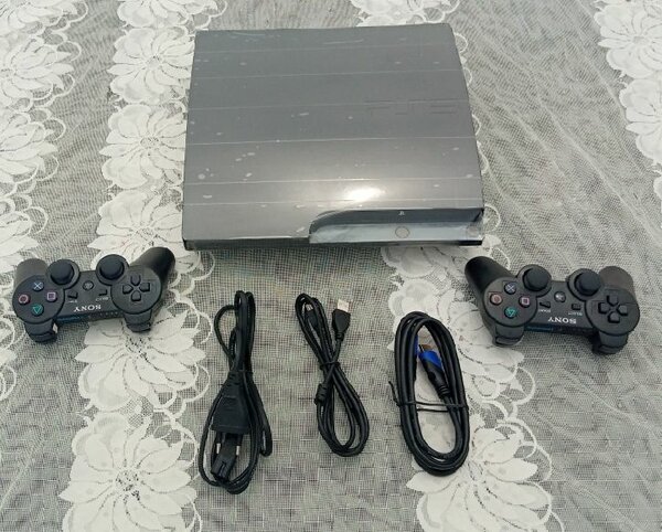 PS3 slim craquée 20 jeux