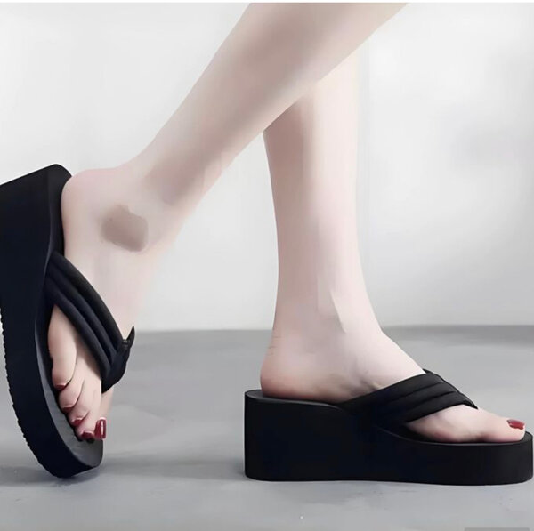 Tongs compensées noires élégantes