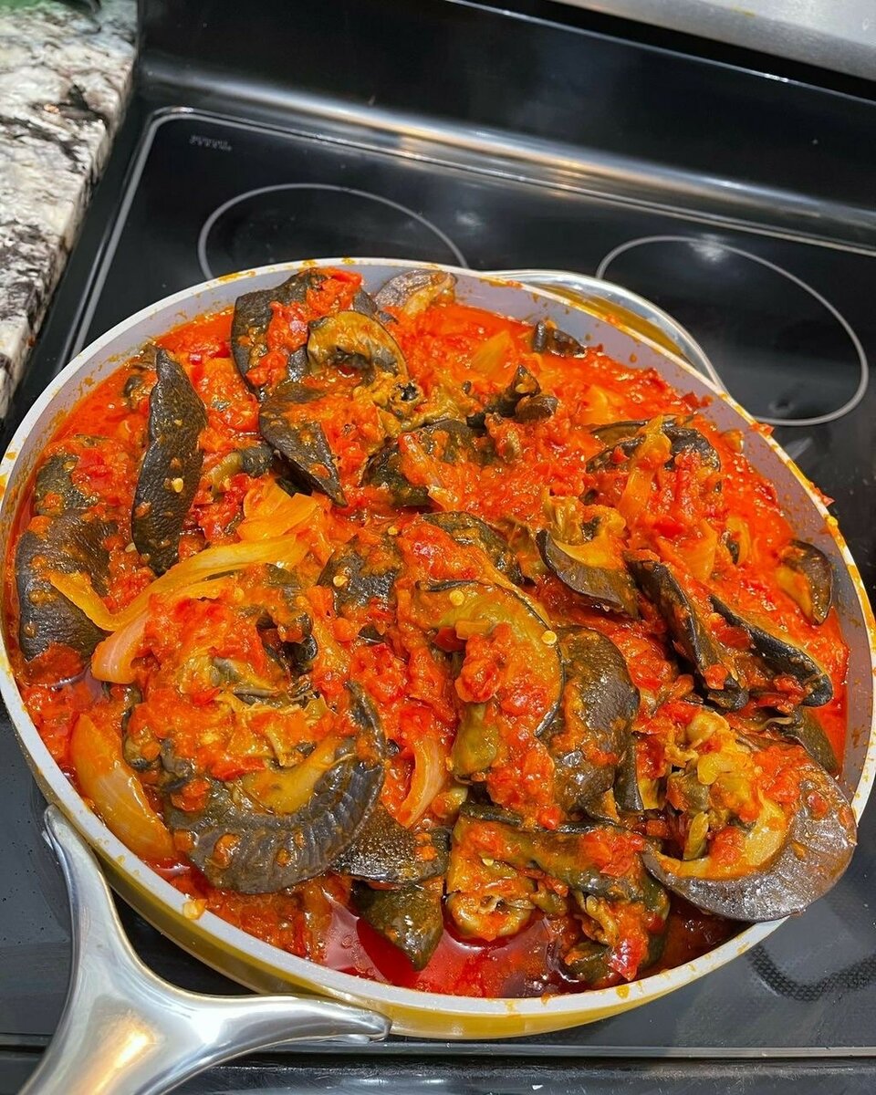 Escargots épicés en sauce tomate