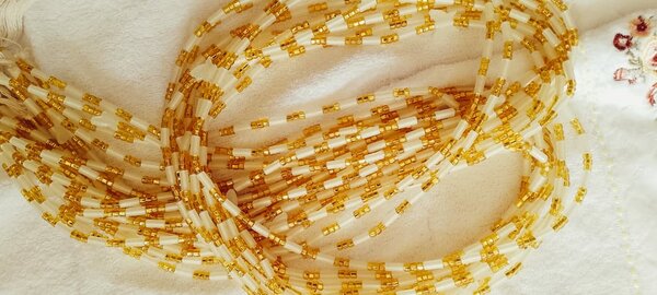 Glow in the dark and gold bead