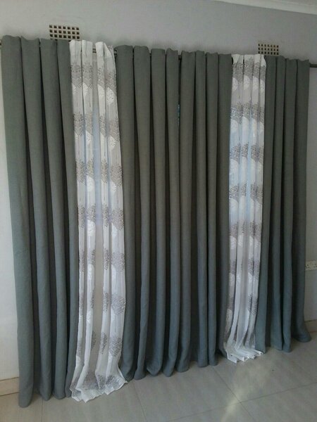 2 drops of curtains green and white with patterns