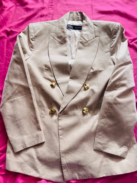 Veste de costume beige pour femme