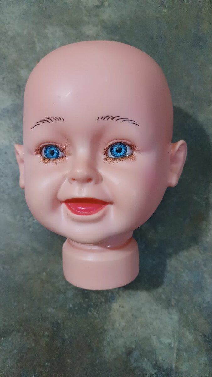 Tête de poupée réaliste
