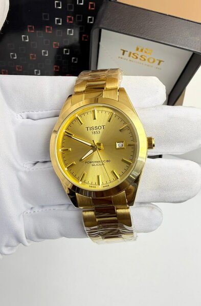 Montre Tissot en or rose pour homme