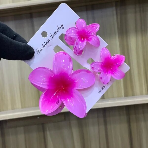 Pinces à cheveux fleurs roses