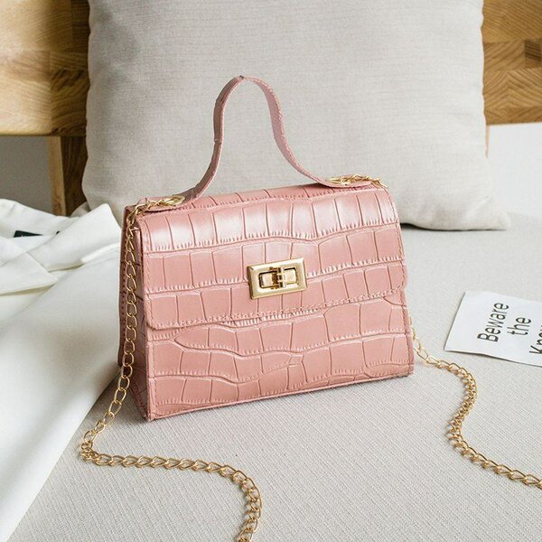 Sac à main motif croco rose