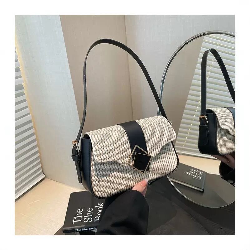 Sac à main élégant tissé