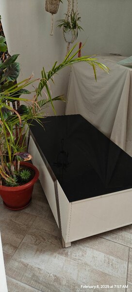 Coffee table, black, white and silver with glass surface