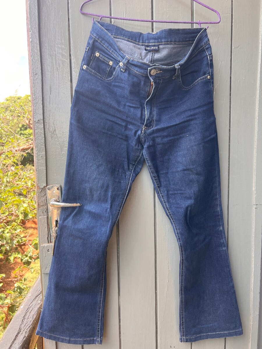 Black ripped jean and blue jeans