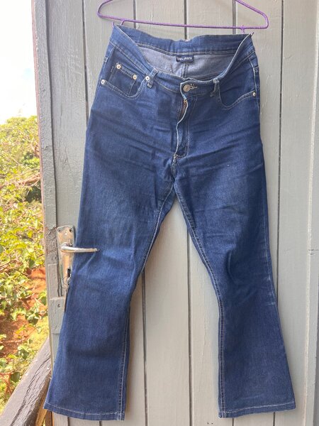 Black ripped jean and blue jeans