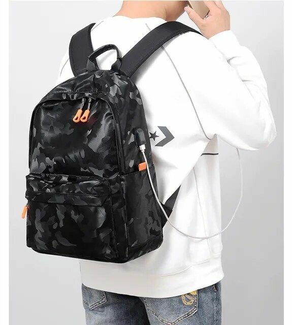 Sac à dos classique pour ordinateur et disposant d'un câble