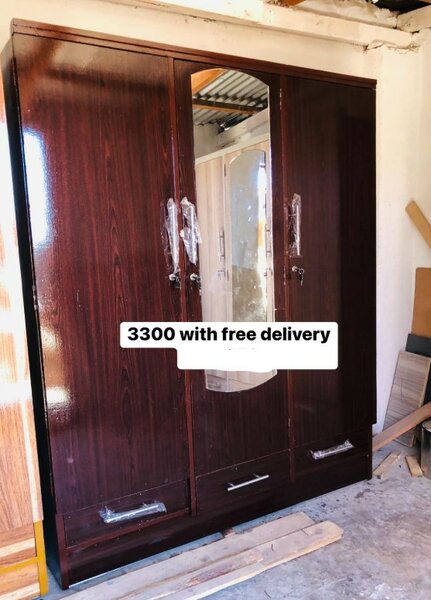 Beautiful dark brown wardrobe with mirror