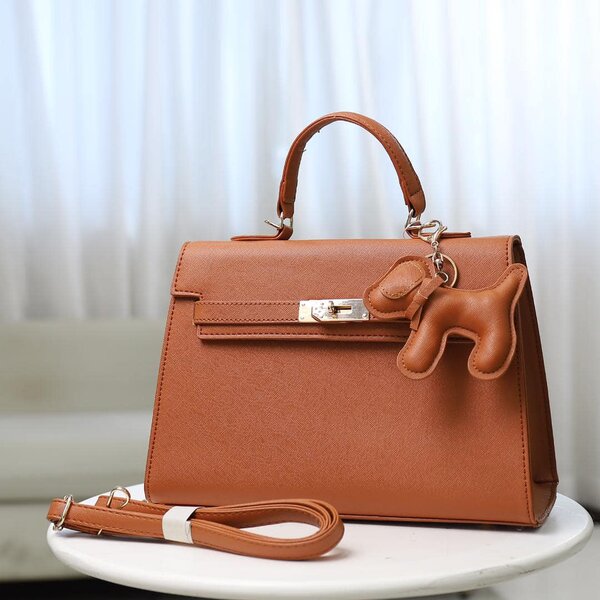 Sac avec porte-clés en forme de chien