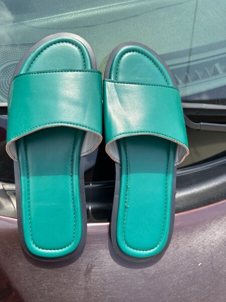 Handmade green leather slides