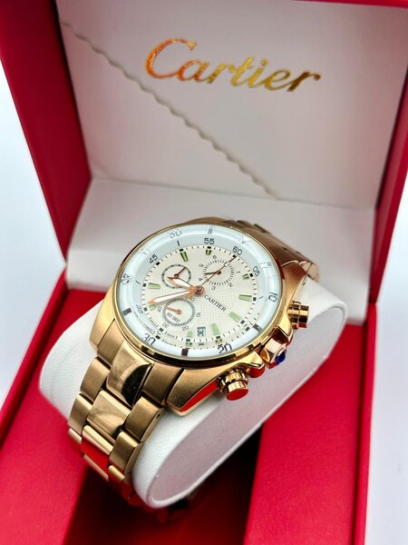 Montre homme dorée Cartier luxe