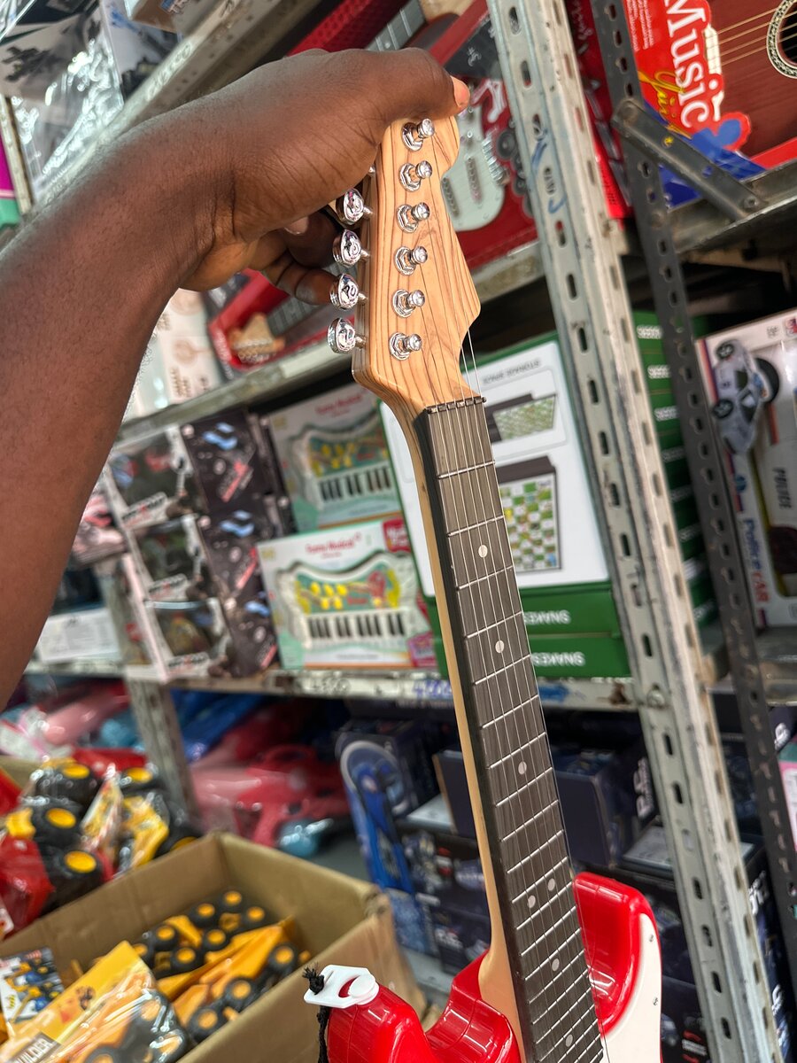 Guitare électrique jouet rouge