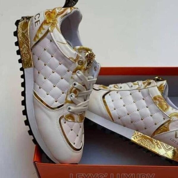 Baskets de luxe en cuir doré