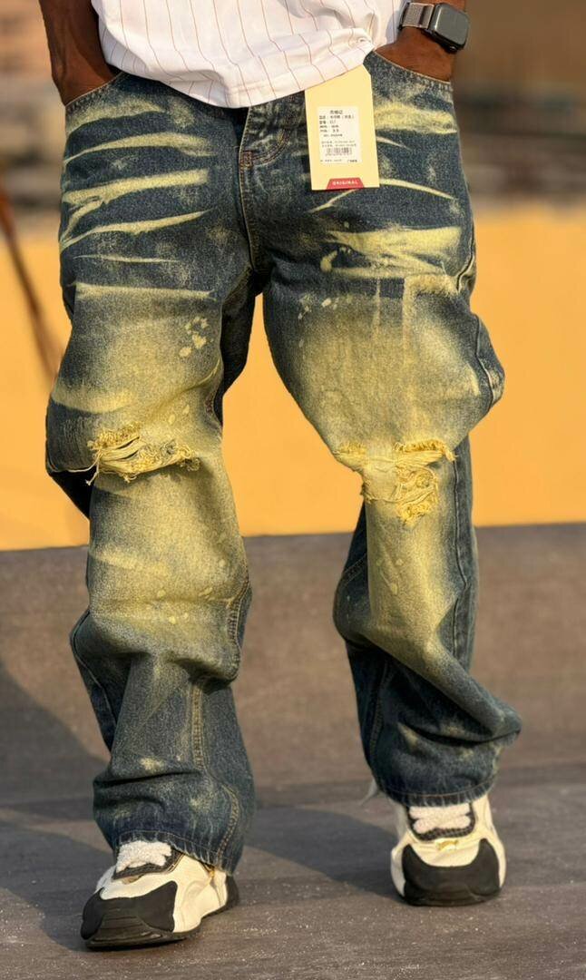 Jeans déchirés homme