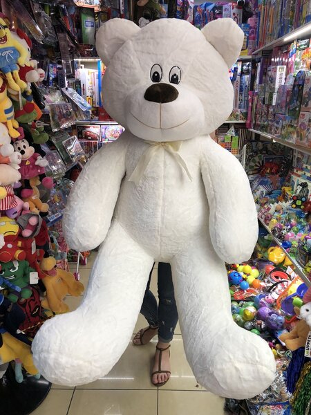 Gros ours en peluche blanc