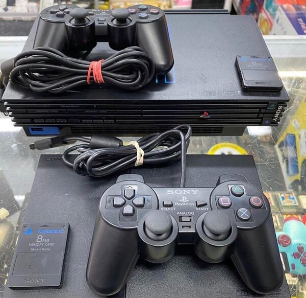 Ps2 2 Manettes 20 jeux