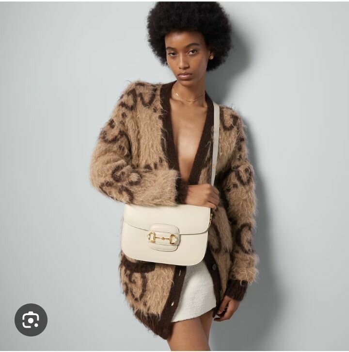 Sac à main Gucci en cuir blanc avec fermoir doré