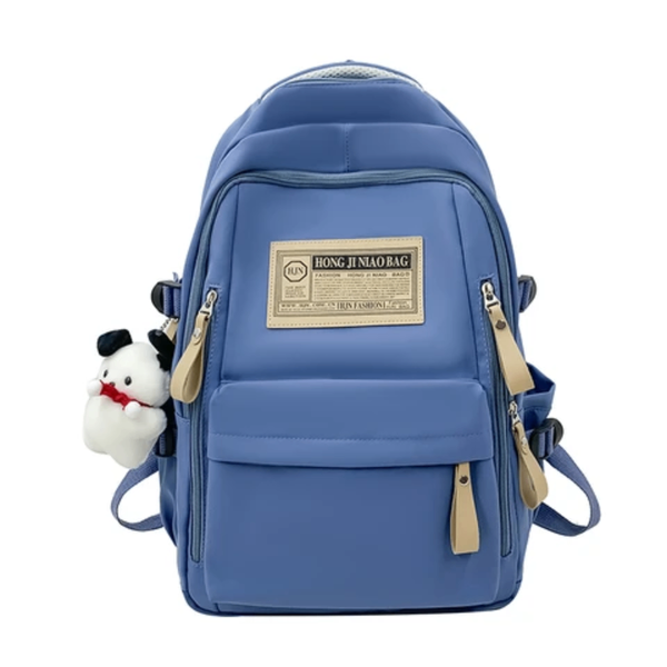 Sac à dos bleu avec pendentif