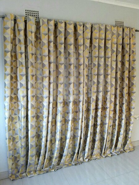 2 drops of curtains yellow with triangles 