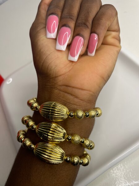 Bracelet perles dorées élégant