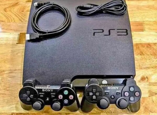 Console Sony PS3 avec manette et accessoires