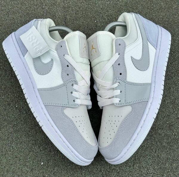 Baskets basses en cuir gris et blanc