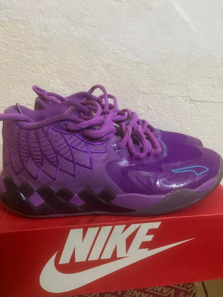 Baskets Nike pour hommes violettes