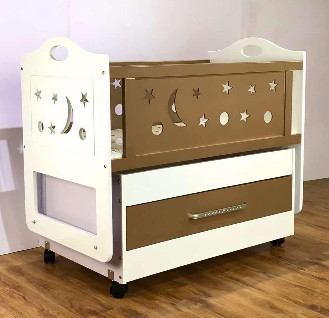 Berceau bébé avec tiroir pratique