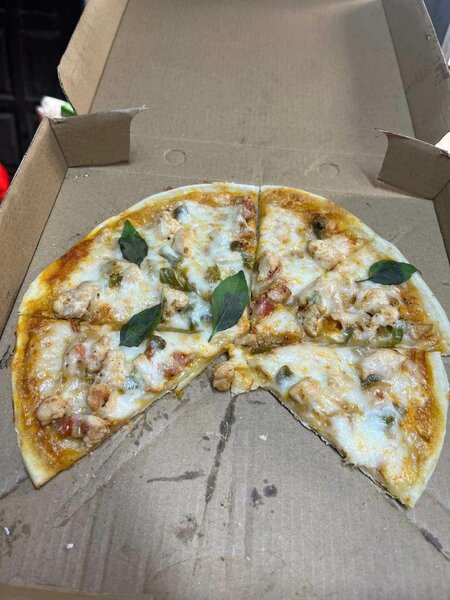 Pizza au poulet savoureuse