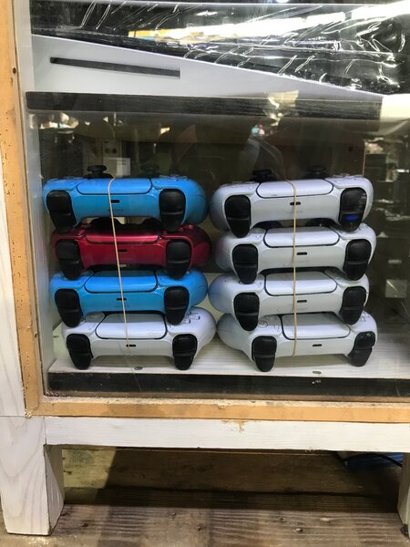 Manette PS4 sans fil grise