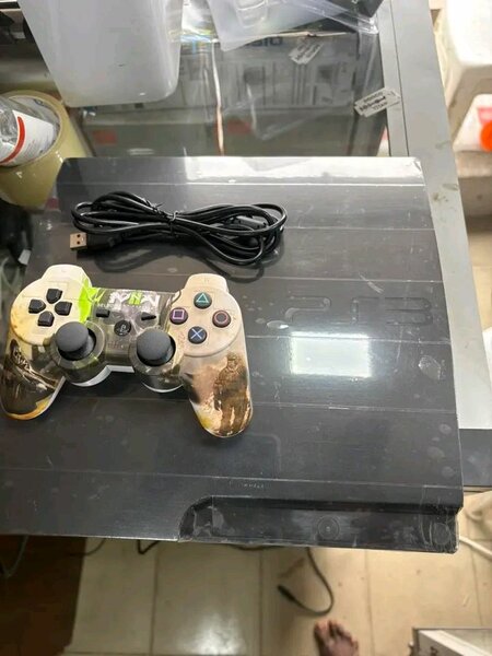 Console PS3 avec manette