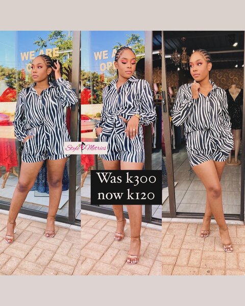 Women's suit in black and white print, shirt and shorts