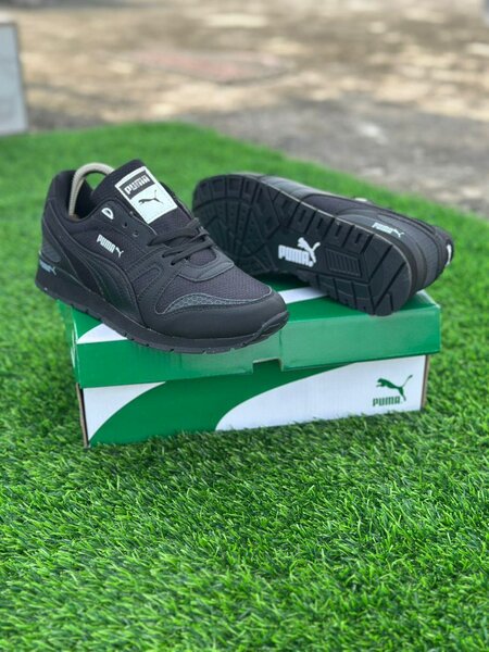 Chaussures PUMA noires unisexes