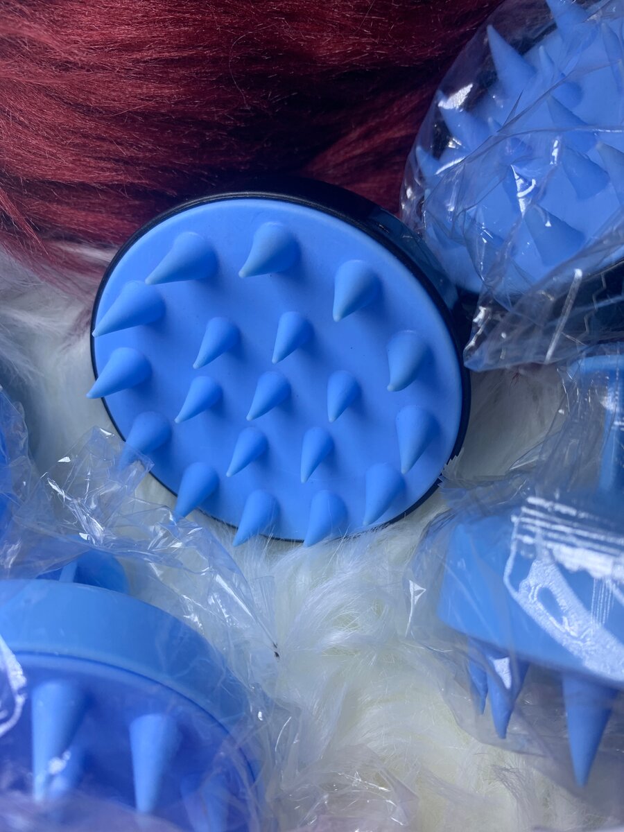 Brosse de massage crânien