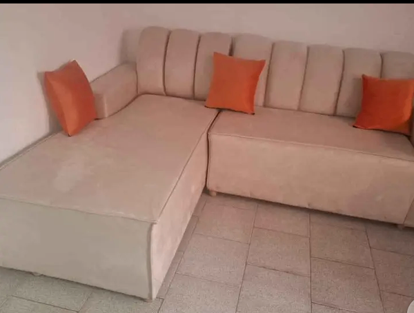 Canapé d'angle convertible simili cuir beige