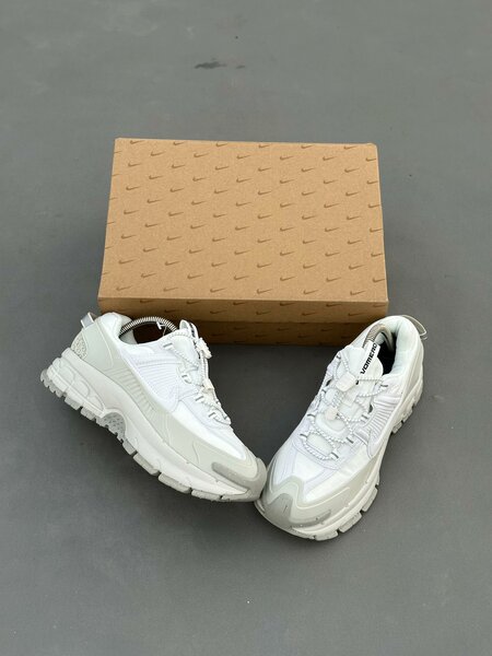 Chaussures de sport blanches pour homme