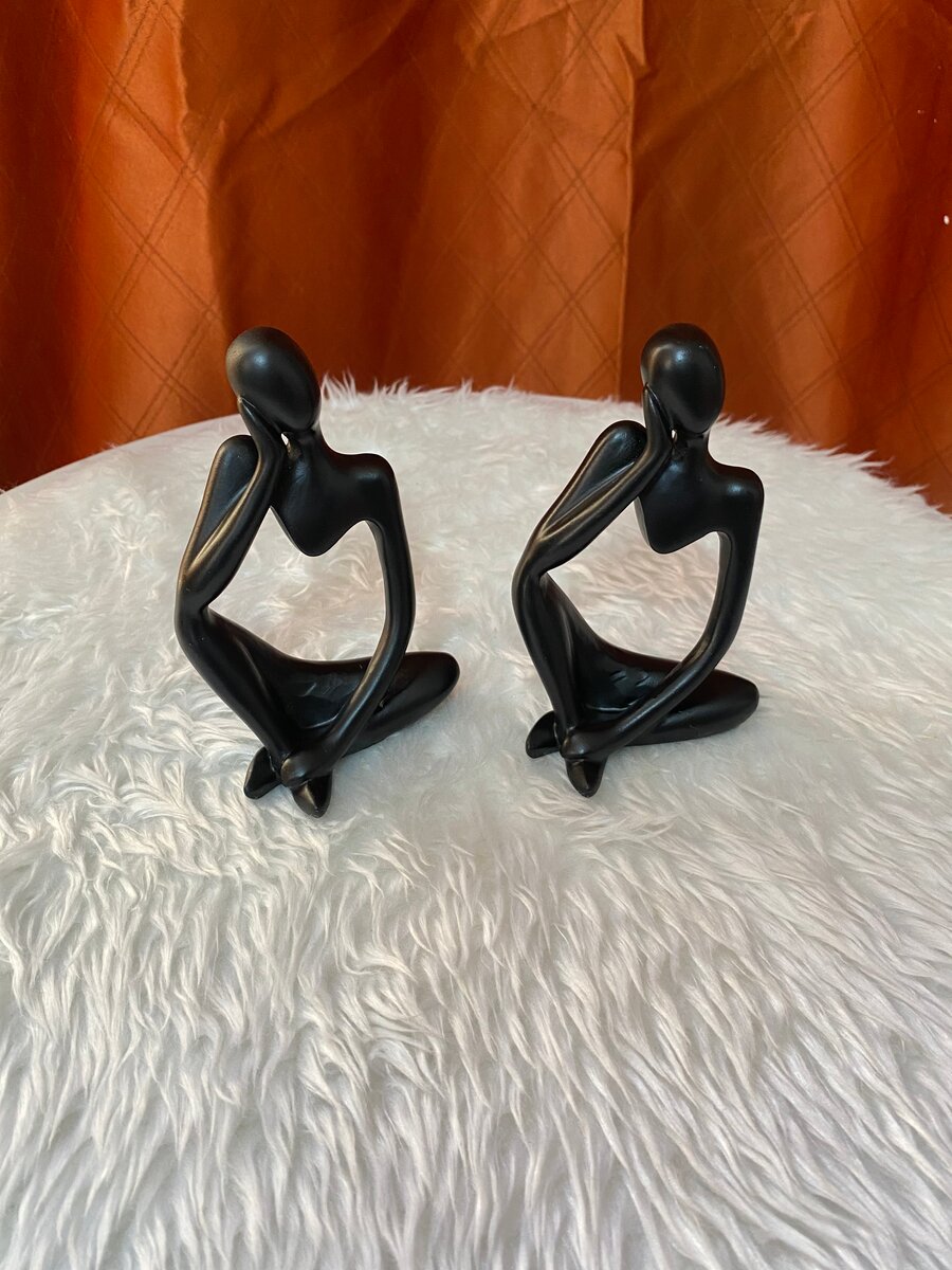 Paire de statues décoratives en métal noir