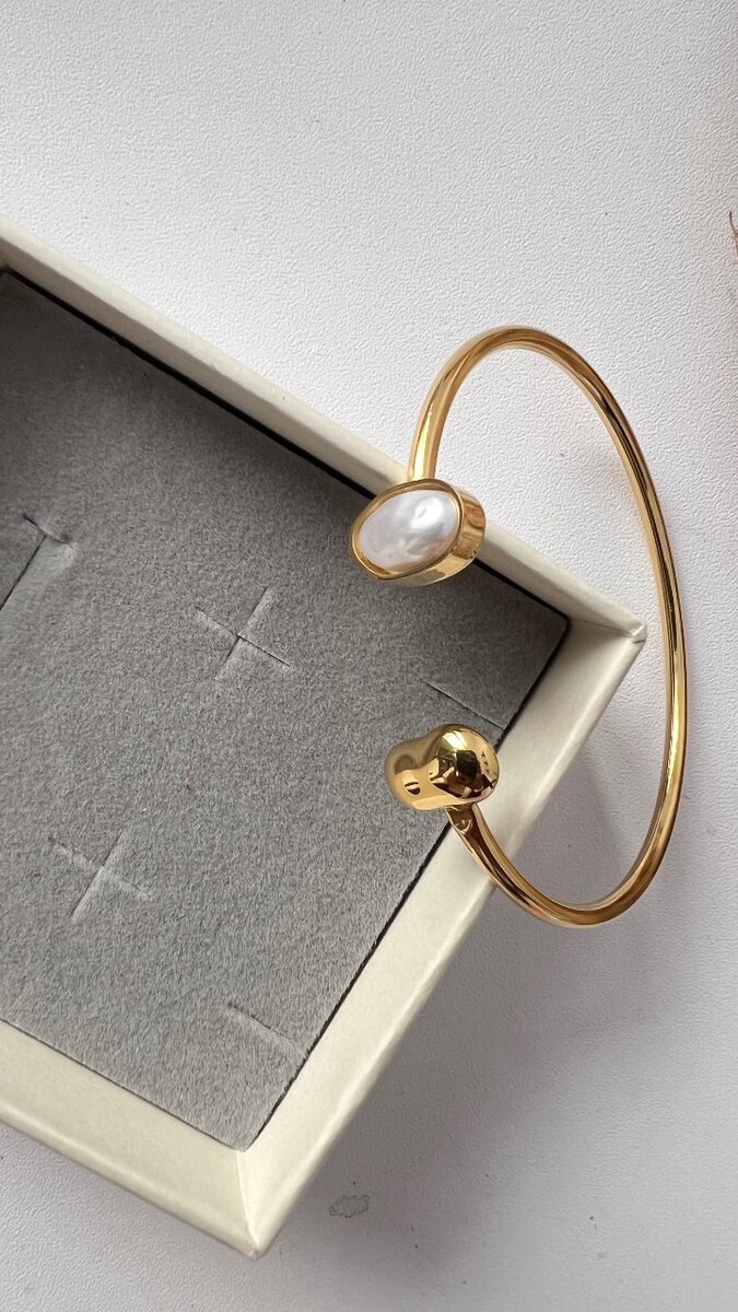 Bracelet en or avec perle